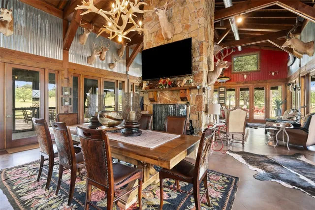 a kitchen with stainless steel appliances a stove a sink and a microwave