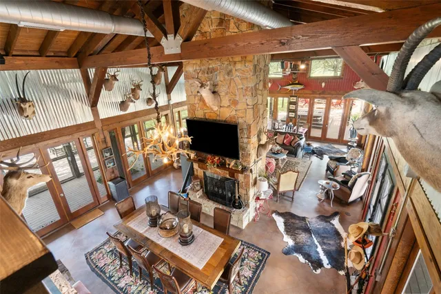 a kitchen with stainless steel appliances granite countertop a sink and a stove