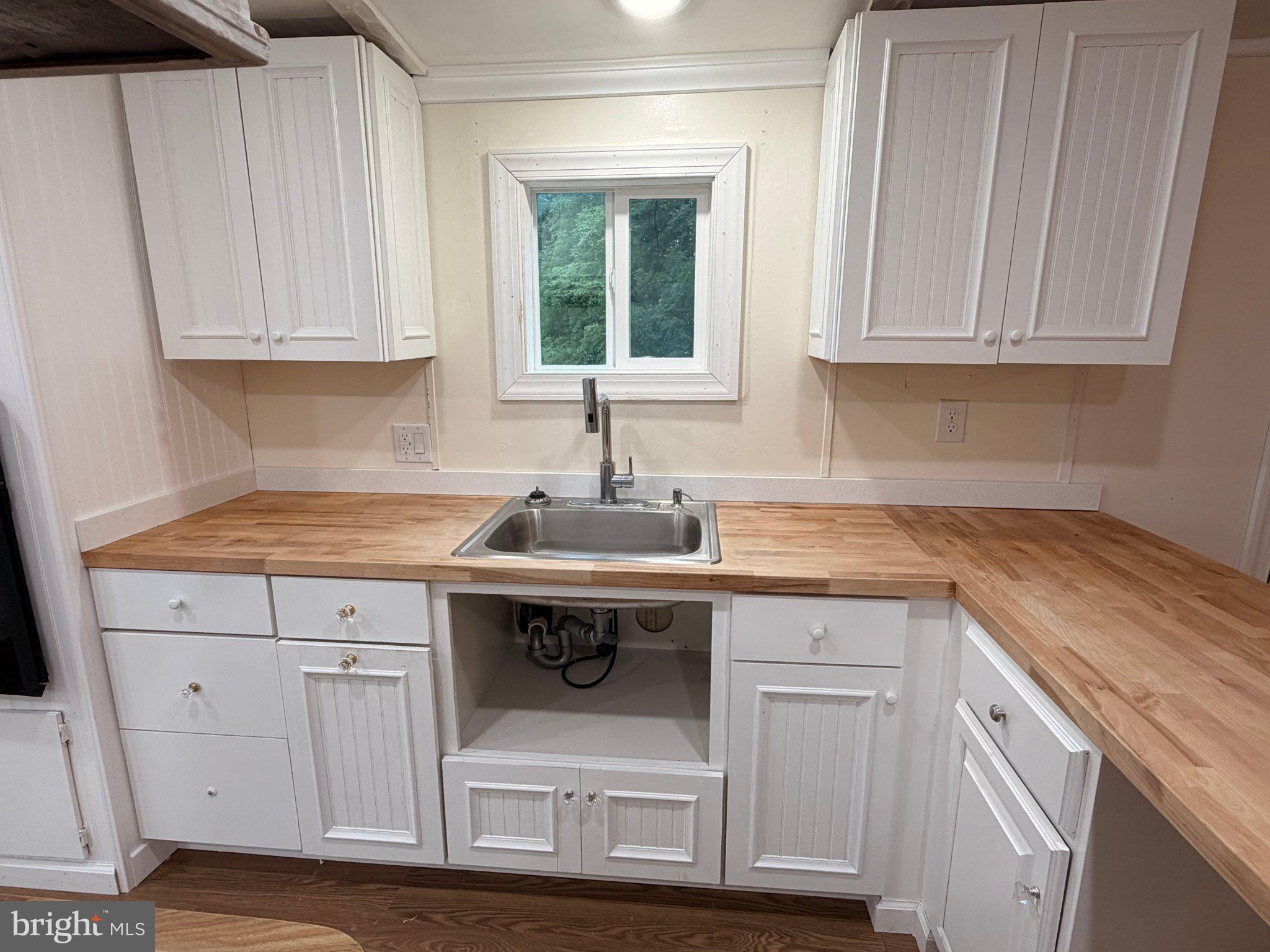 24 Carpenter Street, Unit 24 Dover, DE 19901 - Photo 23 of 27 Bright and airy kitchen oasis.