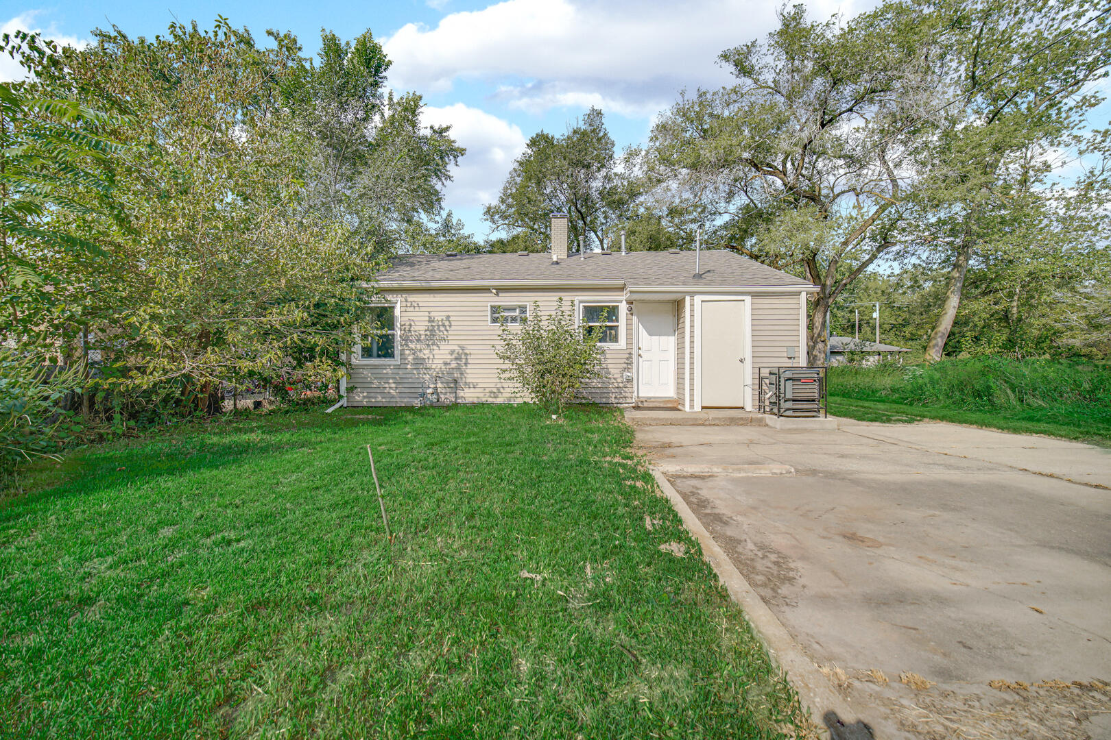 1159 Fayette Street Gary, IN 46403 - Photo 16 of 19 front view of house with a yard