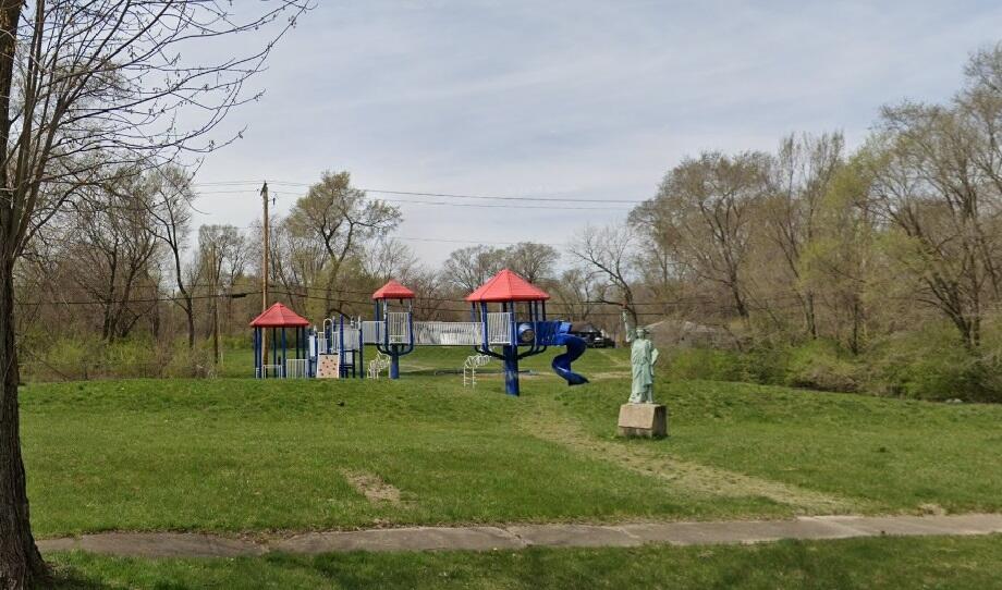 1159 Fayette Street Gary, IN 46403 - Photo 18 of 19 a childrens park with lots of swings and slides