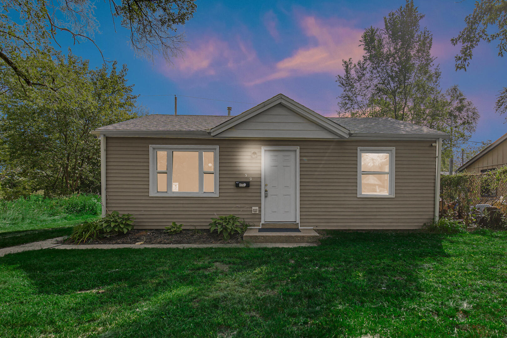 1159 Fayette Street Gary, IN 46403 - Photo 19 of 19 a front view of a house with a yard