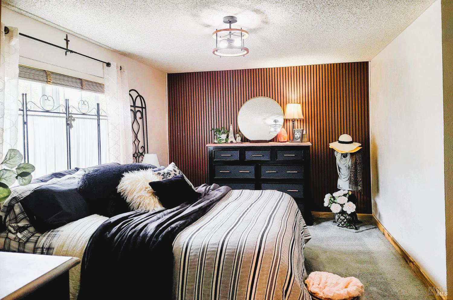 Undisclosed Address Rohnert Park, CA 94928 - Photo 26 of 38 a bedroom with a bed and wooden floor