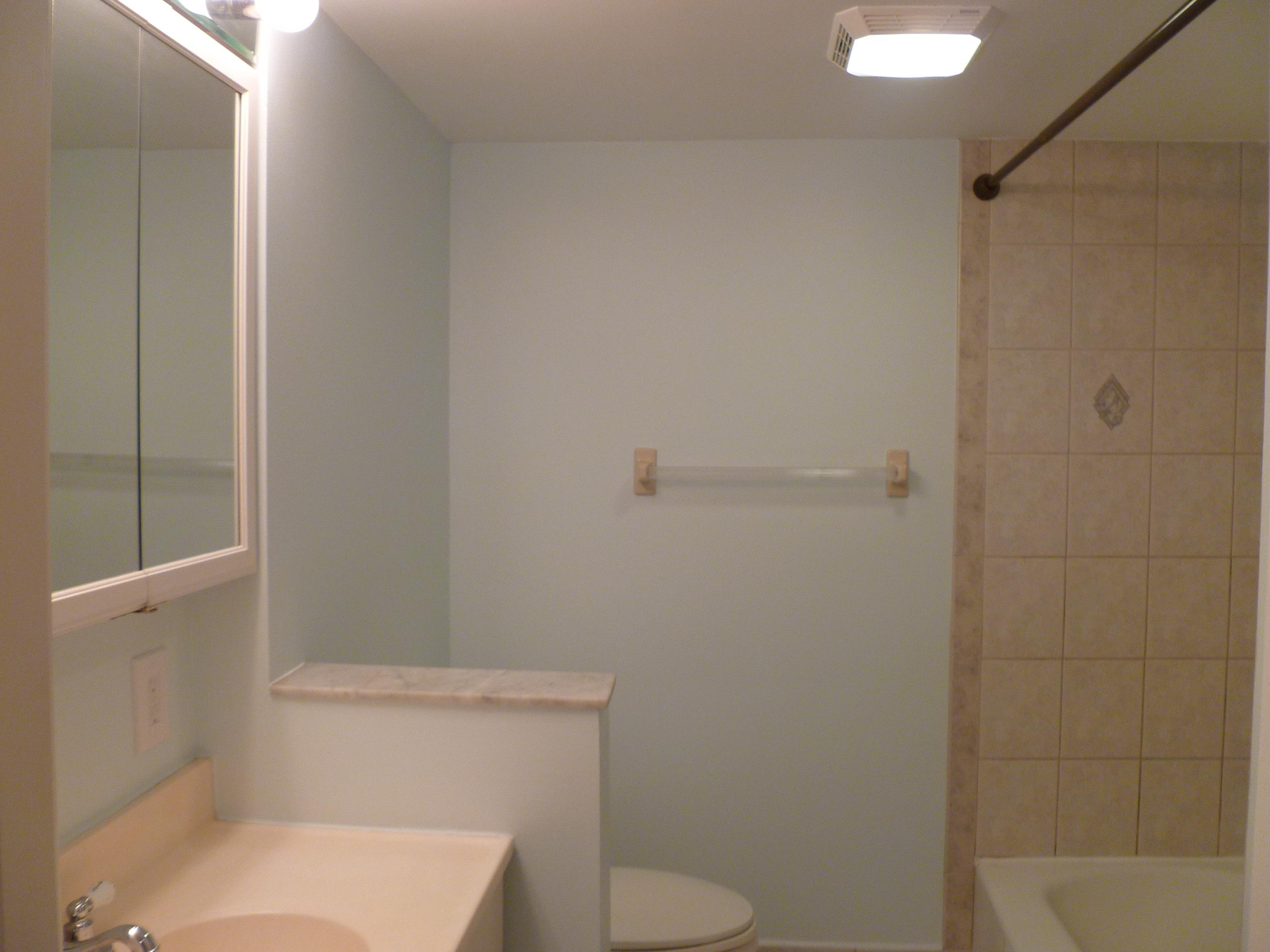 950 Ponce De Leon Road, Unit 104 Boca Raton, FL 33432 - Photo 21 of 33 a bathroom with a toilet and shower