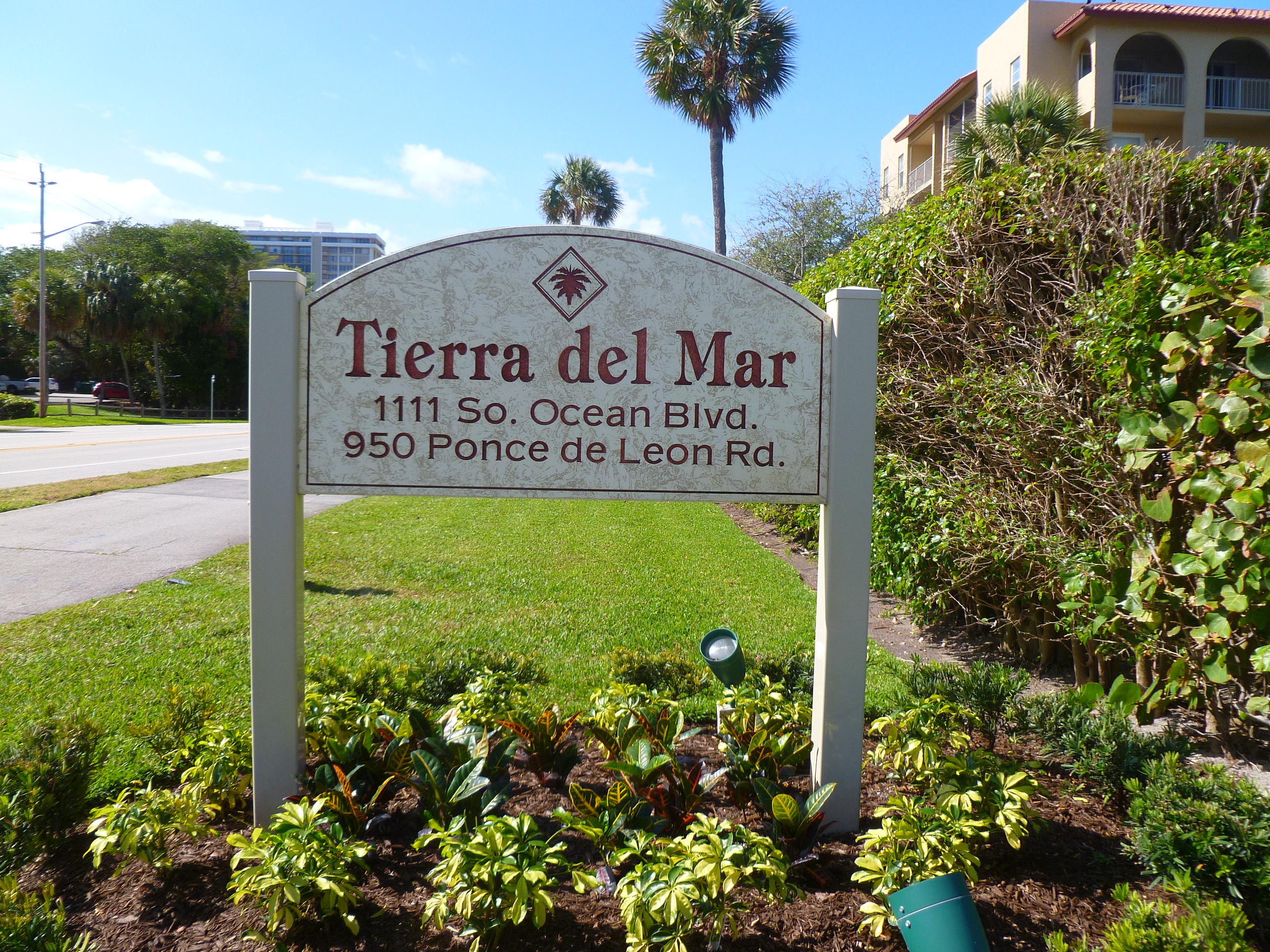 950 Ponce De Leon Road, Unit 104 Boca Raton, FL 33432 - Photo 23 of 33 a sign on the side of the road