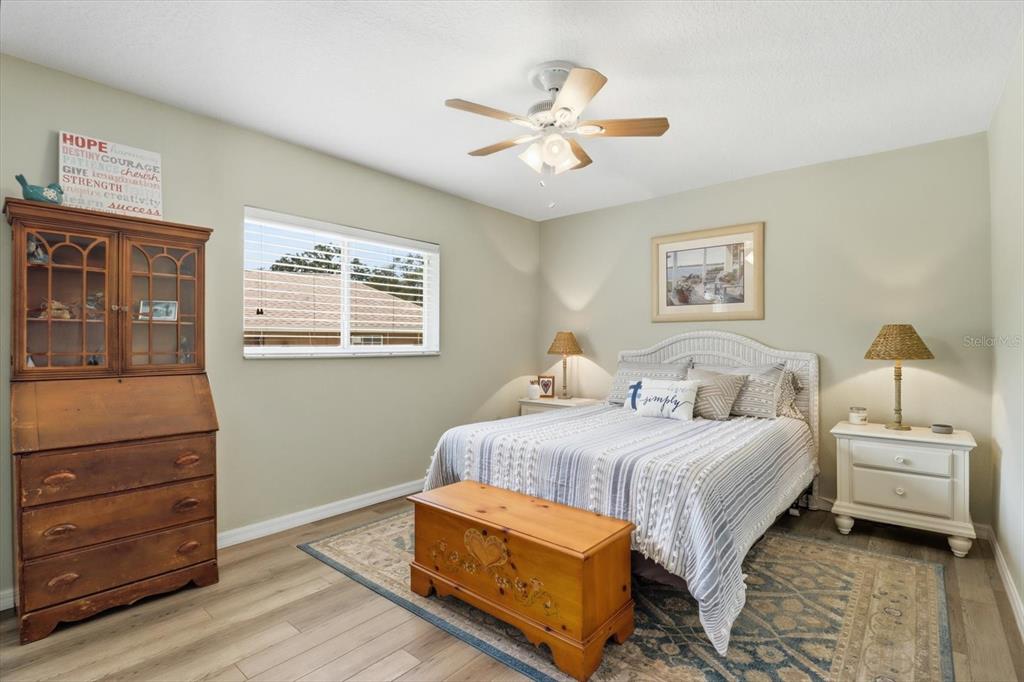 16 Calendula Court Homosassa, FL 34446 - Photo 19 of 50 a bedroom with a bed and cabinet