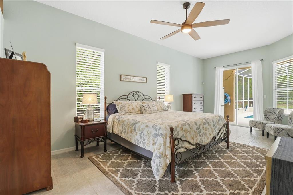 16 Calendula Court Homosassa, FL 34446 - Photo 25 of 50 a bedroom with a bed and a window