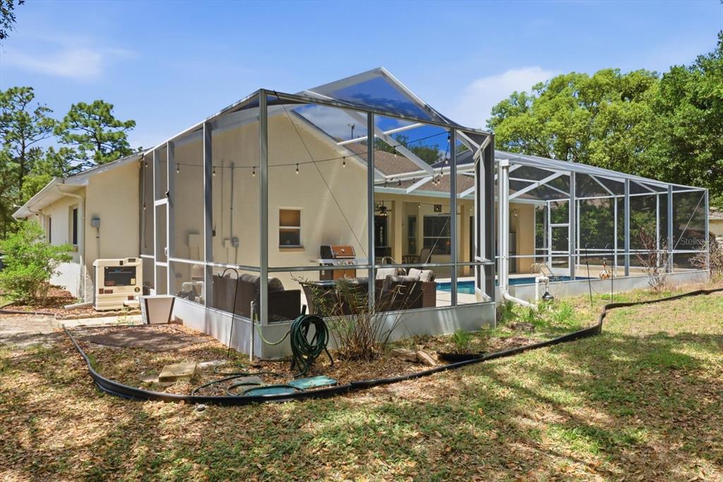 16 Calendula Court Homosassa, FL 34446 - Photo 39 of 50 a view of a house with backyard