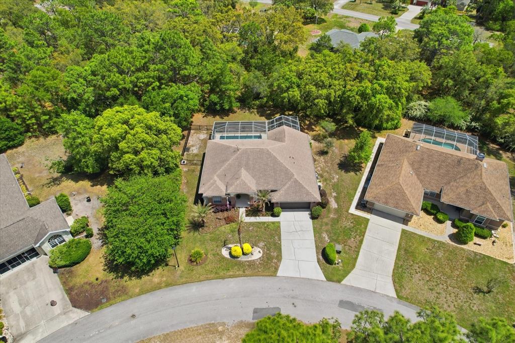 16 Calendula Court Homosassa, FL 34446 - Photo 43 of 50 an aerial view of residential house with outdoor space and parking
