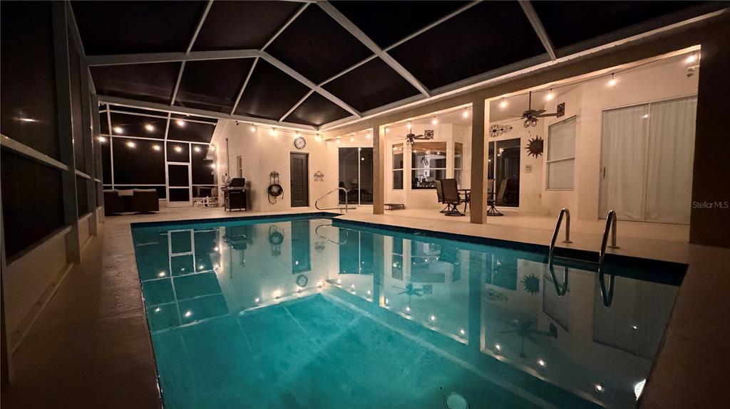 16 Calendula Court Homosassa, FL 34446 - Photo 46 of 50 a view of a swimming pool with a balcony