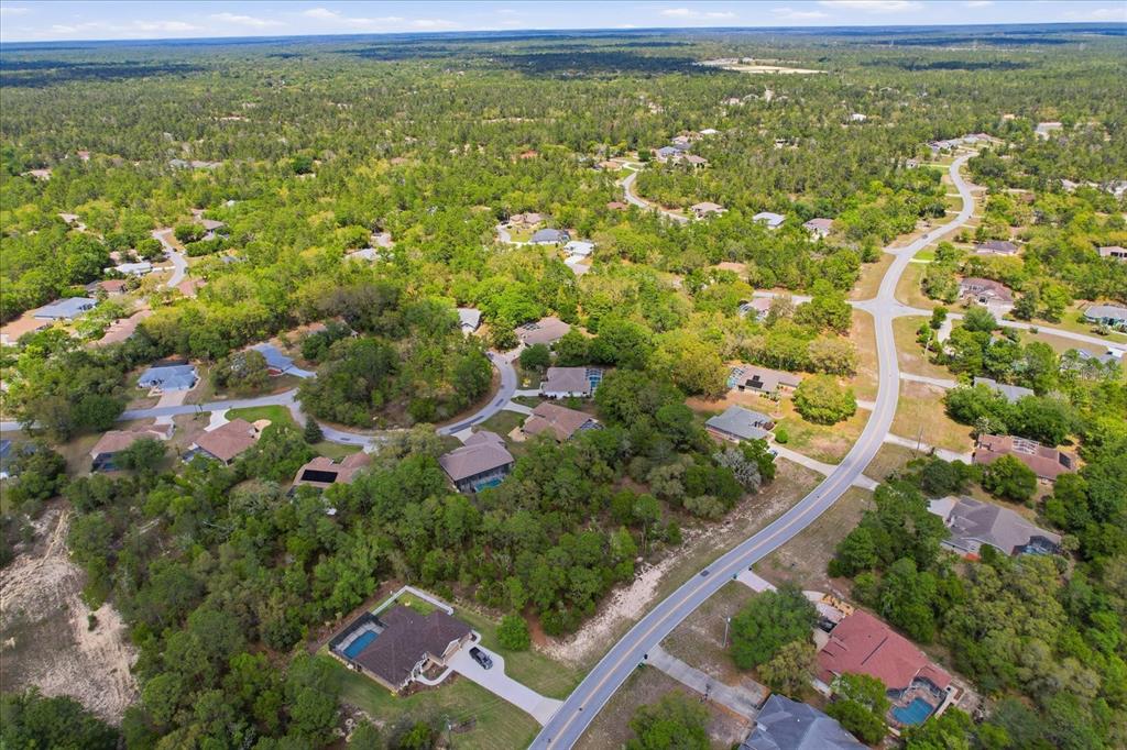 16 Calendula Court Homosassa, FL 34446 - Photo 48 of 50 a view of a yard with an outdoor space