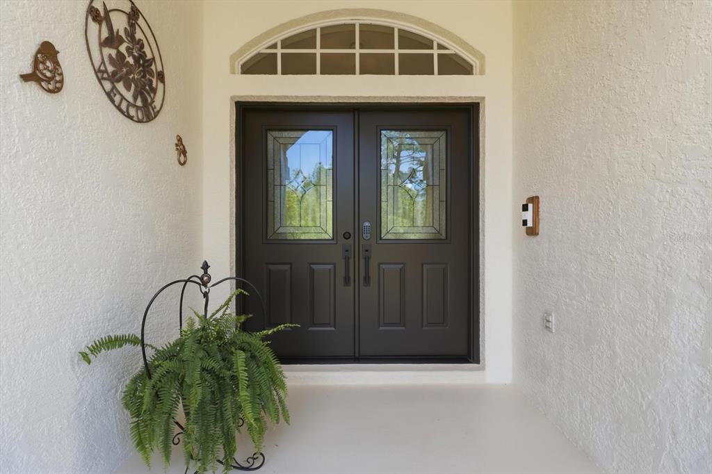 16 Calendula Court Homosassa, FL 34446 - Photo 7 of 50 a front view of a house with a window