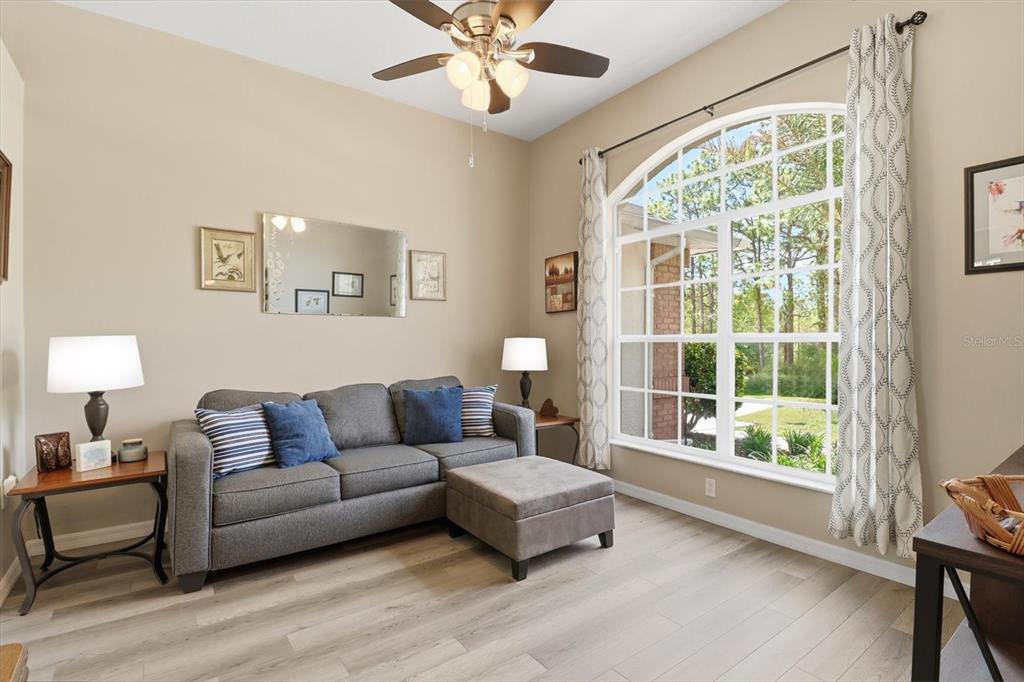 16 Calendula Court Homosassa, FL 34446 - Photo 10 of 50 a living room with furniture and a large window