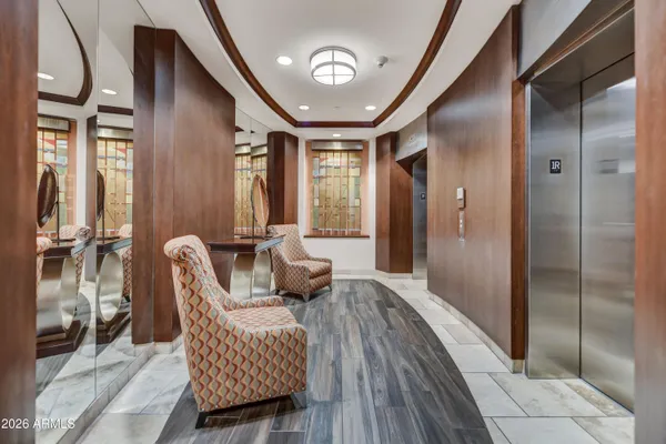 a view of a livingroom with furniture and a flat screen tv