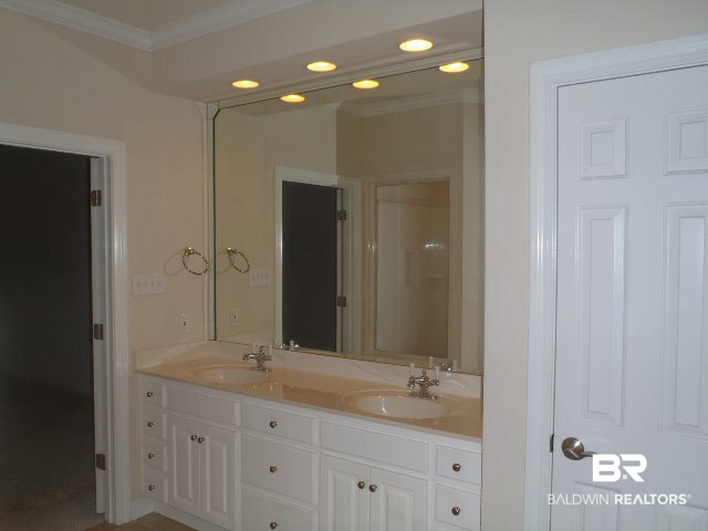 107 Chestnut Ridge Fairhope, AL 36532 - Photo 15 of 20 Master bathroom has a spacious double vanity, huge walk in shower, separate tub and enclosed toilet closet.