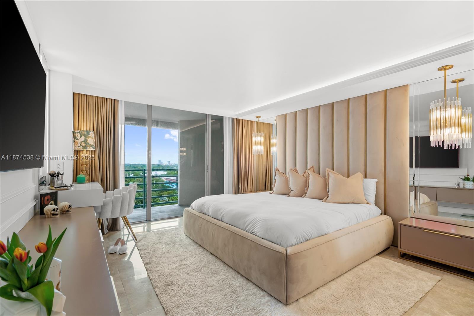 2025 Brickell Avenue, Unit 1705 Miami, FL 33129 - Photo 15 of 50 a bedroom with a large bed and a large window