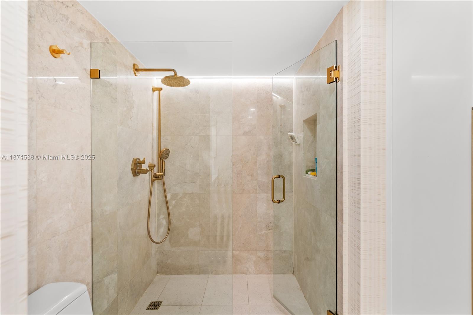2025 Brickell Avenue, Unit 1705 Miami, FL 33129 - Photo 20 of 50 a bathroom with a shower