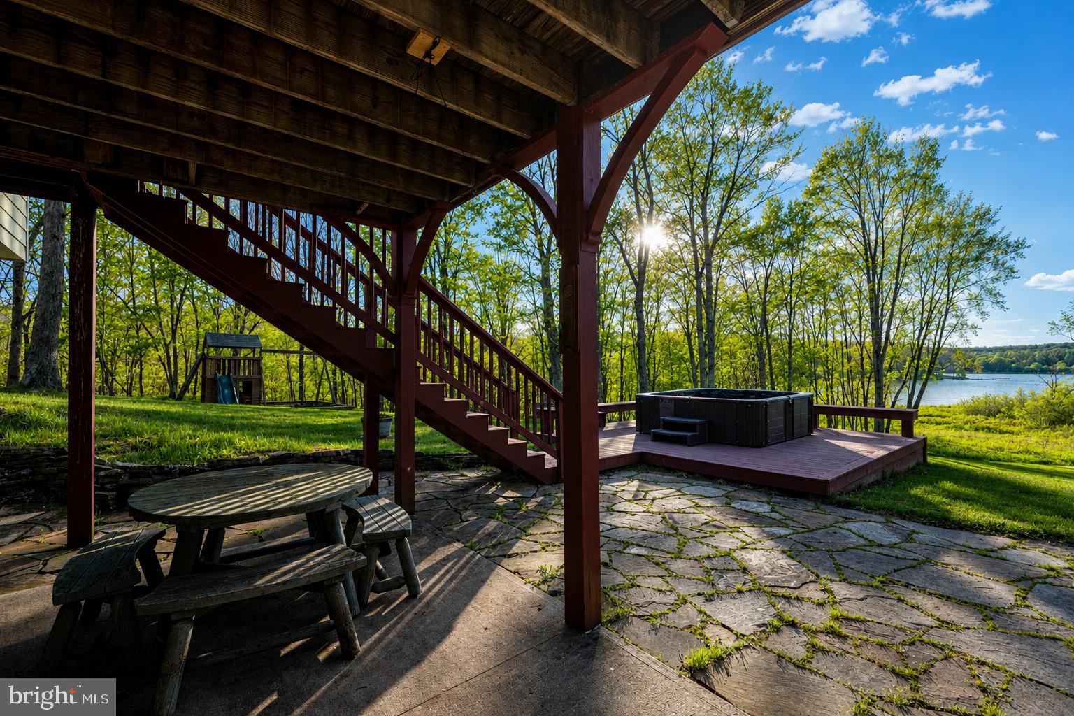 185 Ruta Lane Swanton, MD 21561 - Photo 40 of 81 a view of a porch with furniture and a backyard