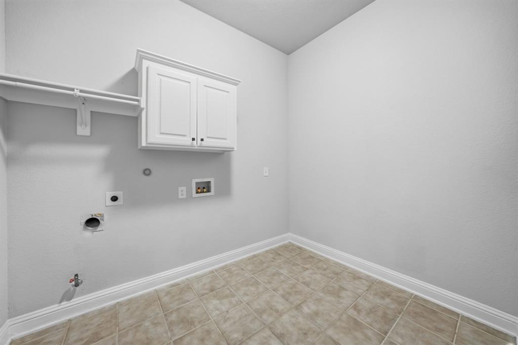 3475 Pilgrim Drive Frisco, TX 75034 - Photo 15 of 33 a view of storage and utility room with empty racks