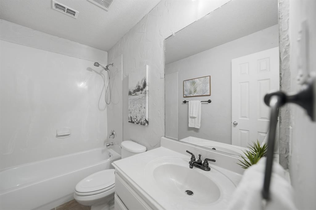 3475 Pilgrim Drive Frisco, TX 75034 - Photo 26 of 33 a bathroom with a sink a toilet and shower