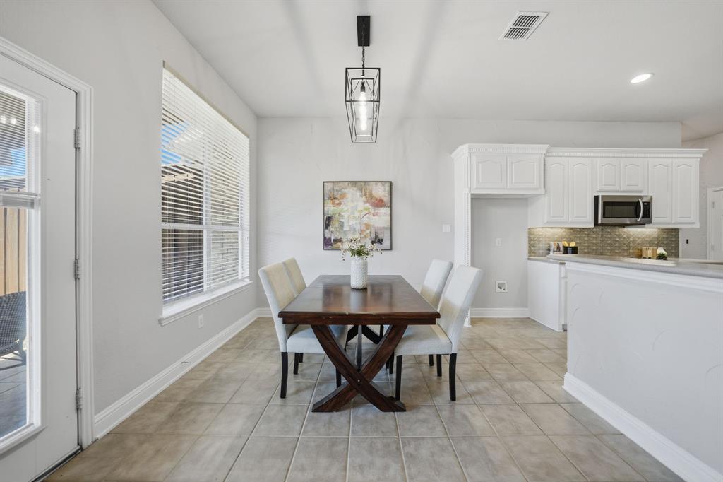 3475 Pilgrim Drive Frisco, TX 75034 - Photo 9 of 33 a dining room with furniture and window