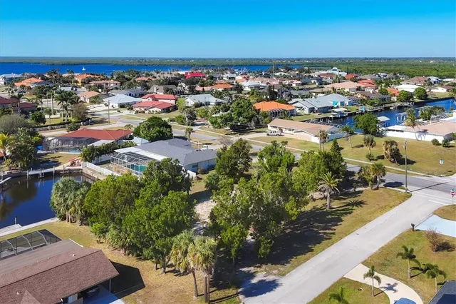 an aerial view of a houses with outdoor space