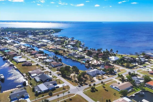 an aerial view of residential building with parking space
