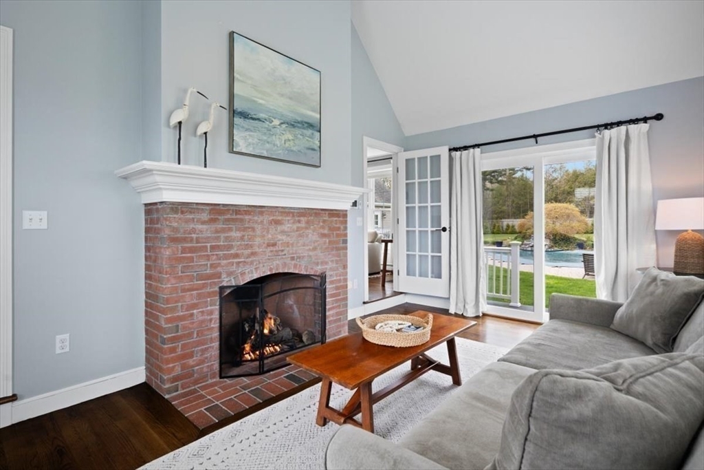 88 Jedediah's Path Marshfield, MA 02050 - Photo 11 of 41 a living room with furniture and a fireplace