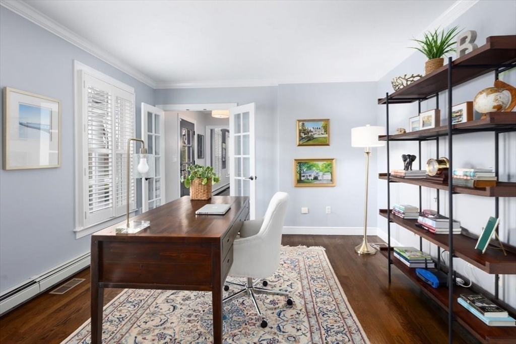 88 Jedediah's Path Marshfield, MA 02050 - Photo 12 of 41 a living room with furniture and a book shelf