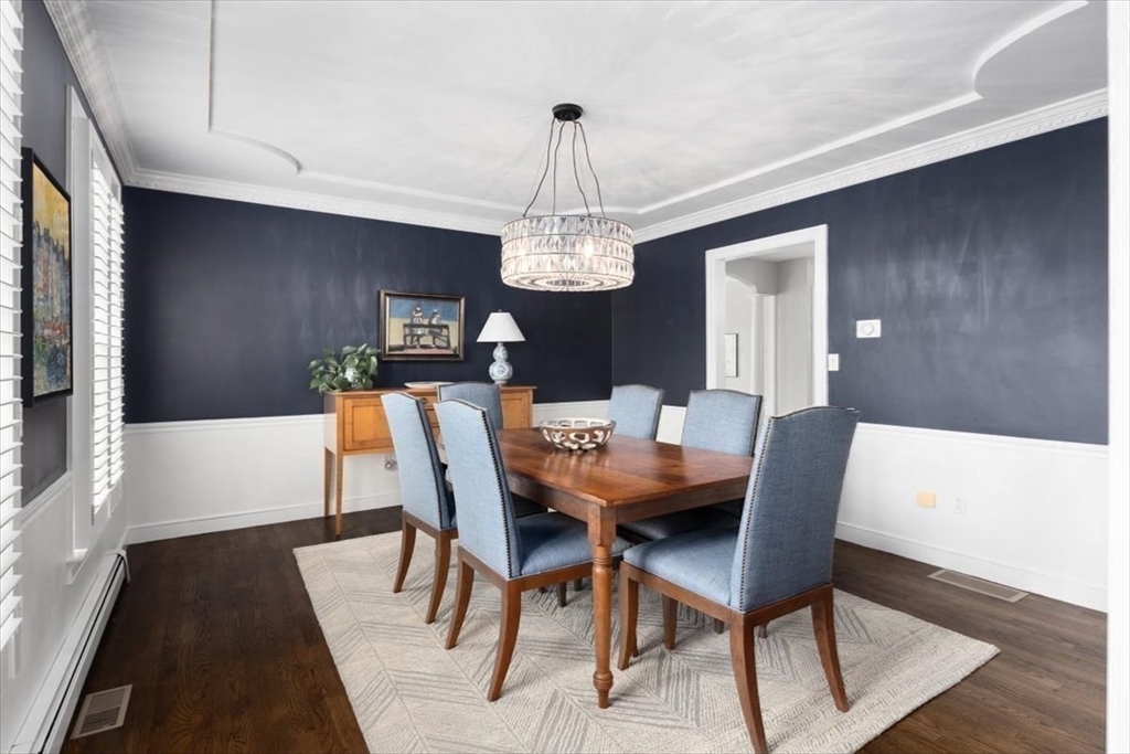 88 Jedediah's Path Marshfield, MA 02050 - Photo 14 of 41 a view of a dining room with furniture window and wooden floor