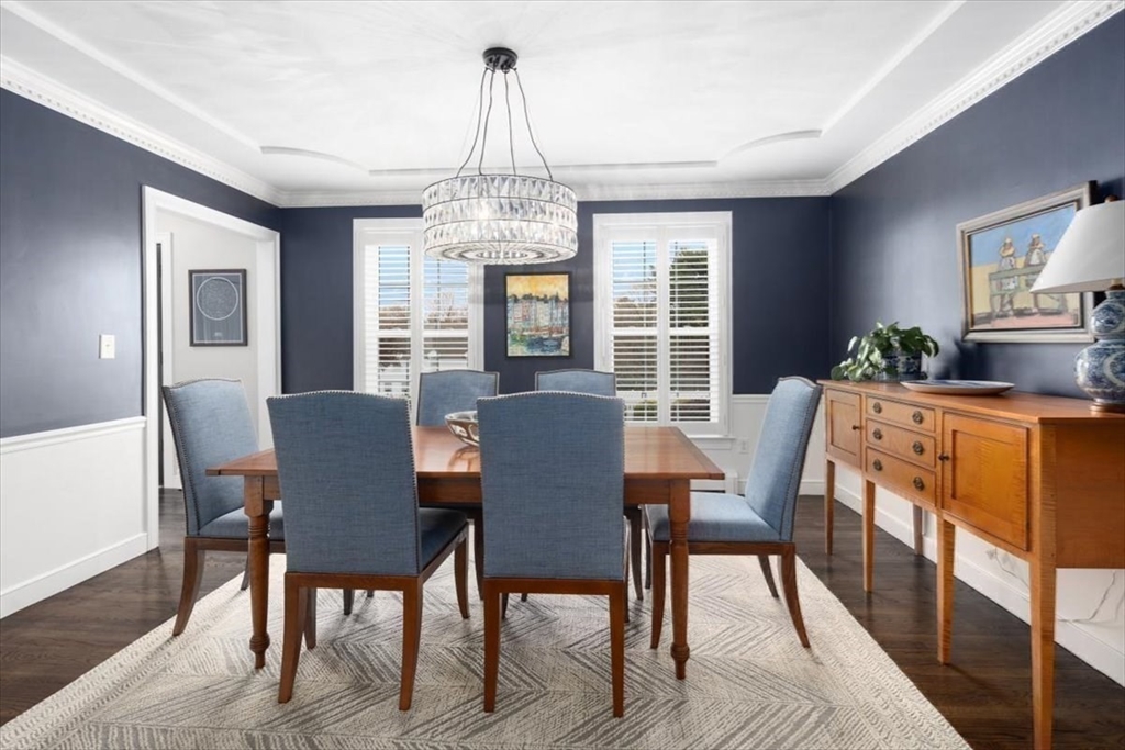 88 Jedediah's Path Marshfield, MA 02050 - Photo 15 of 41 a view of a dining room with furniture window and wooden floor
