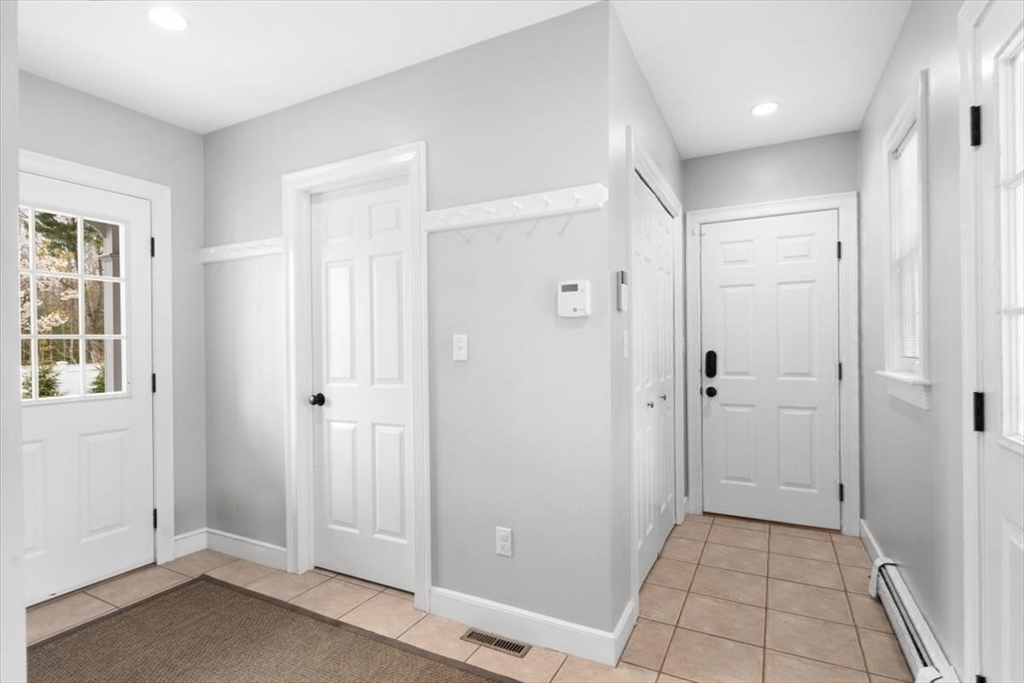 88 Jedediah's Path Marshfield, MA 02050 - Photo 18 of 41 a view of a hallway with closet and bathroom