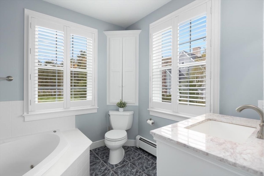 88 Jedediah's Path Marshfield, MA 02050 - Photo 22 of 41 a bathroom with a sink a toilet and a bathtub