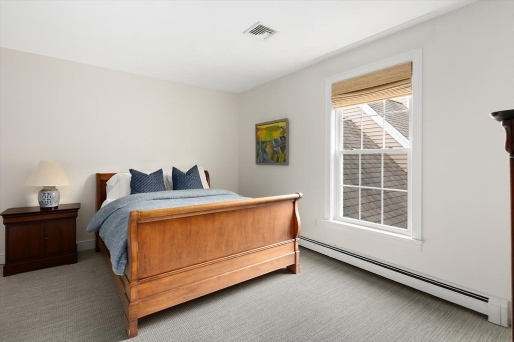 88 Jedediah's Path Marshfield, MA 02050 - Photo 23 of 41 a bed sitting in a bedroom next to a window