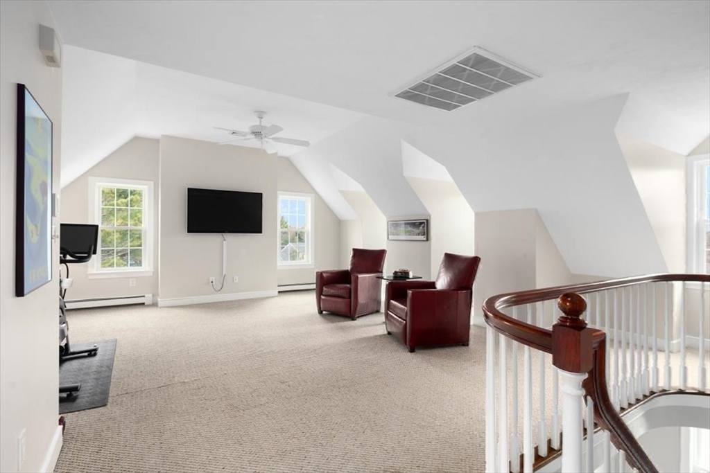 88 Jedediah's Path Marshfield, MA 02050 - Photo 27 of 41 a living room with furniture and a flat screen tv