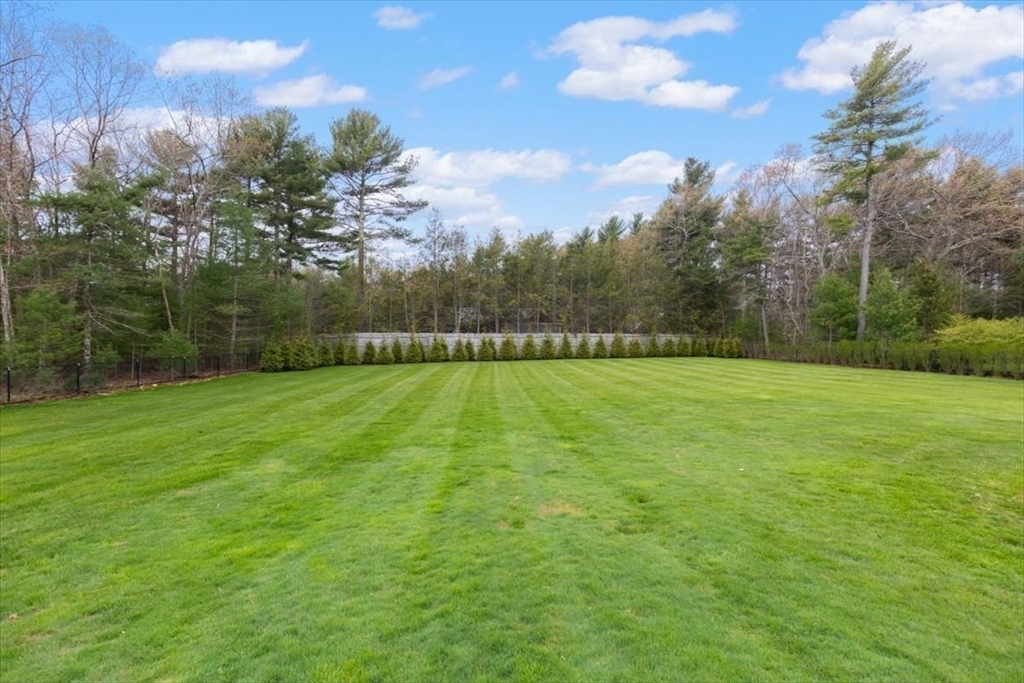 88 Jedediah's Path Marshfield, MA 02050 - Photo 32 of 41 a view of an outdoor space and a yard