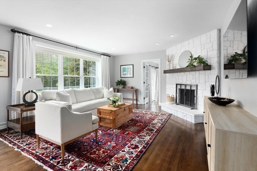 88 Jedediah's Path Marshfield, MA 02050 - Photo 5 of 41 a living room with furniture a window and a fireplace