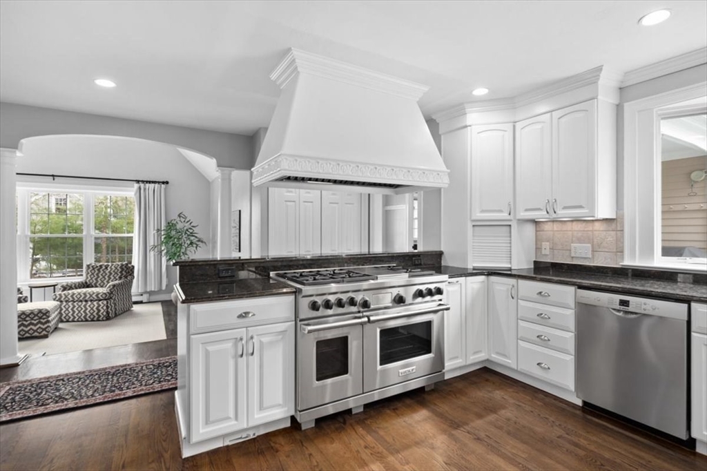88 Jedediah's Path Marshfield, MA 02050 - Photo 7 of 41 a kitchen with stainless steel appliances white cabinets and a stove