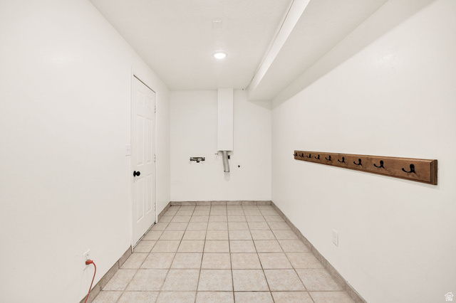 365 South Center Street Fielding, UT 84311 - Photo 28 of 41 Laundry area featuring baseboards and light tile patterned flooring