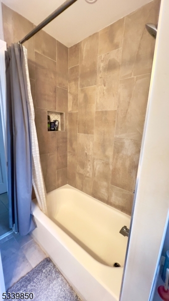 511 Hussa Street, Unit 2 Linden, NJ 07036 - Photo 9 of 13 a bathroom with a tub