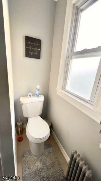 511 Hussa Street, Unit 2 Linden, NJ 07036 - Photo 10 of 13 a white toilet sitting next to a window