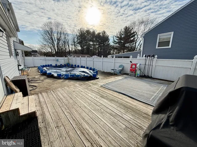 a view of a chairs on the roof deck