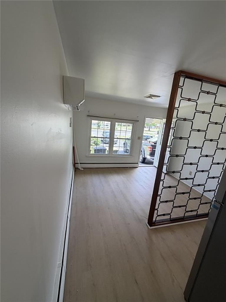 5391 Chapmans Road, Unit 1 Orefield, PA 18069 - Photo 3 of 7 Laminate flooring throughout offers a clean, versatile canvas for any design aesthetic.