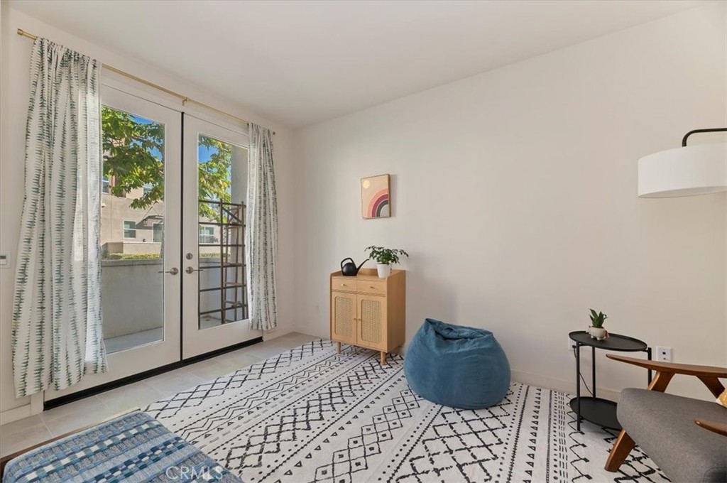 11012 Serenity Drive Rancho Cucamonga, CA 91730 - Photo 11 of 37 a room with a baby crib and a window