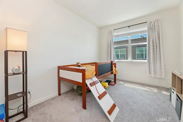 a room with furniture and a window