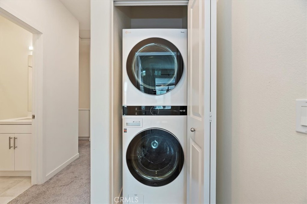 11012 Serenity Drive Rancho Cucamonga, CA 91730 - Photo 21 of 37 a close up view of a washer and dryer