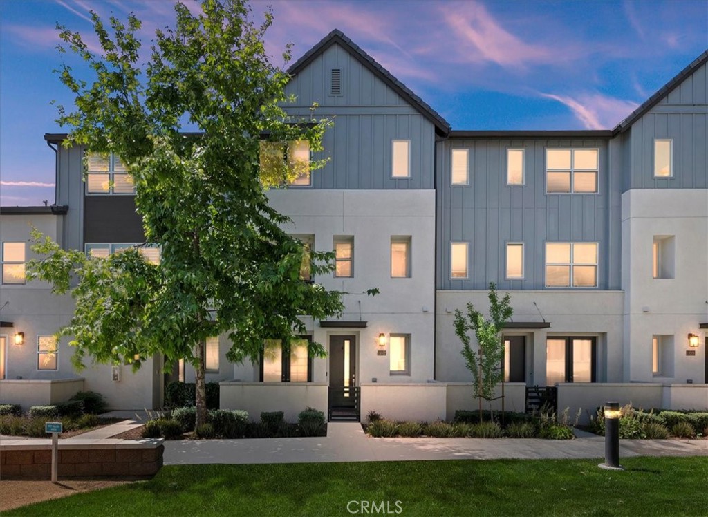 11012 Serenity Drive Rancho Cucamonga, CA 91730 - Photo 26 of 37 a front view of house with yard and green space