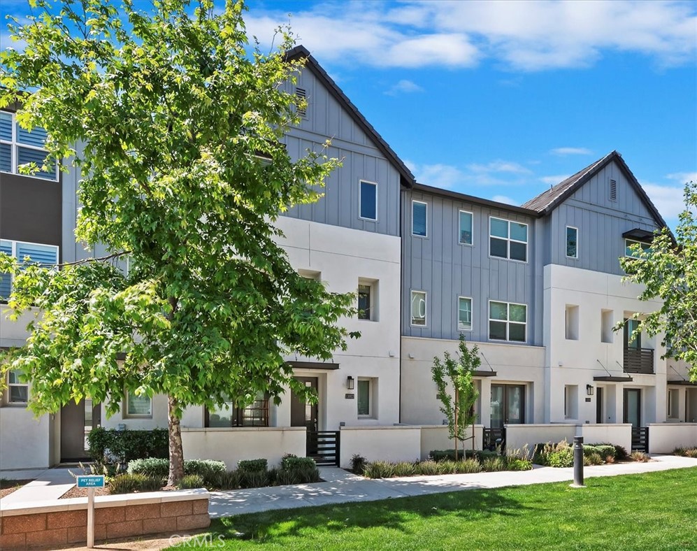 11012 Serenity Drive Rancho Cucamonga, CA 91730 - Photo 27 of 37 a front view of a house with a yard