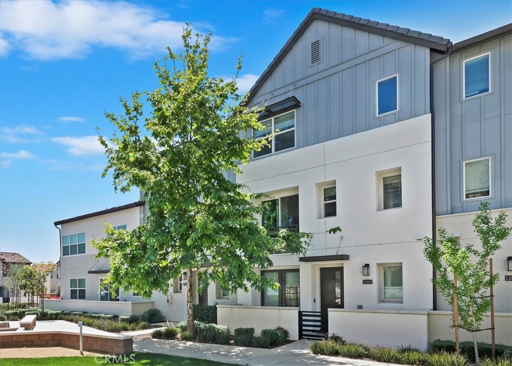 11012 Serenity Drive Rancho Cucamonga, CA 91730 - Photo 29 of 37 a front view of a house with a yard