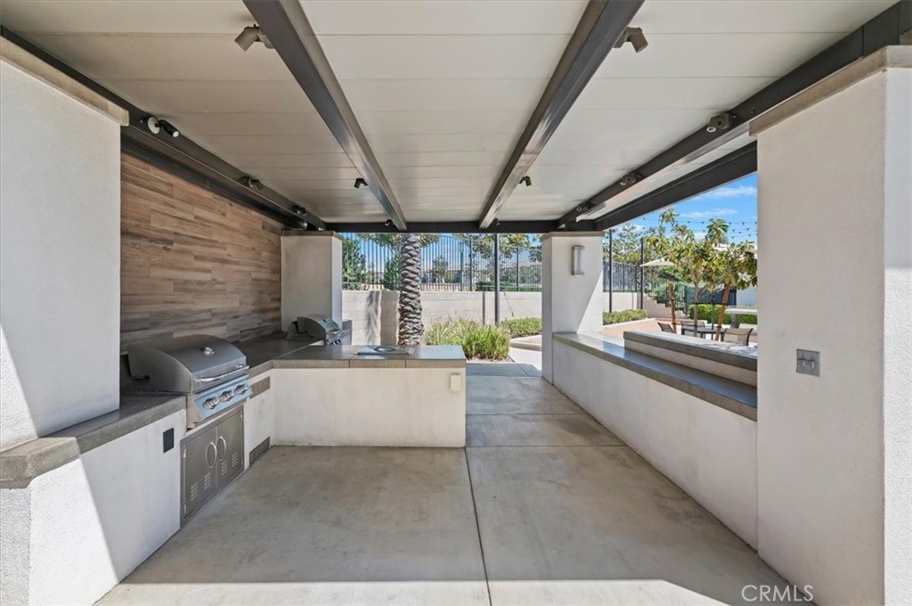 11012 Serenity Drive Rancho Cucamonga, CA 91730 - Photo 34 of 37 a large white kitchen with a large window